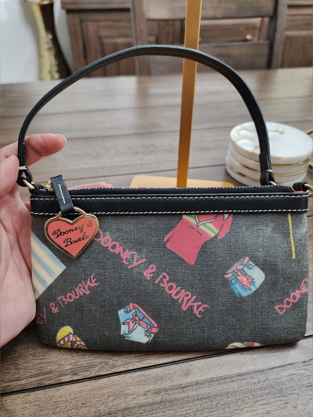 Dooney & Bourke Black Printed Wristlet Or Shoulder Mini Bag- Red Inside.